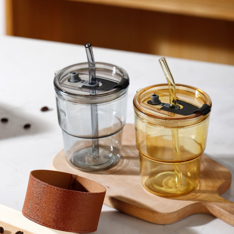 Tazas de vidrio de bambú en línea resistentes al calor tazas de paja de café ins viento alto valor de mano impresión de tazas de agua de regalo