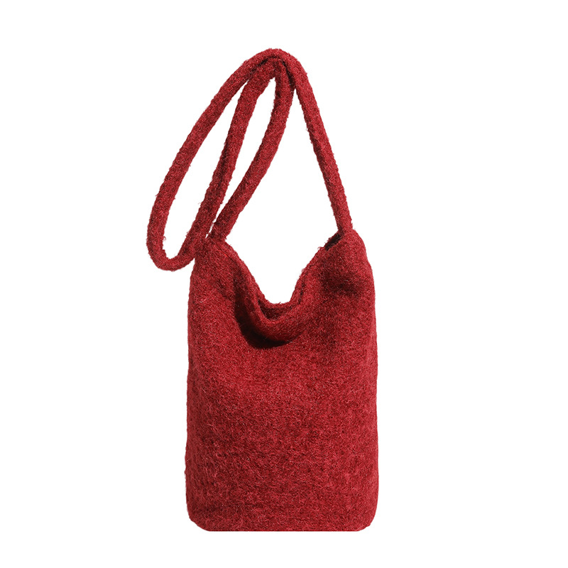 Bolsa de moda coreana de lana 2025 nuevo bolso de cubo de peluche suave glutinoso estilo extranjero de moda bolso de hombro de una sola mujer