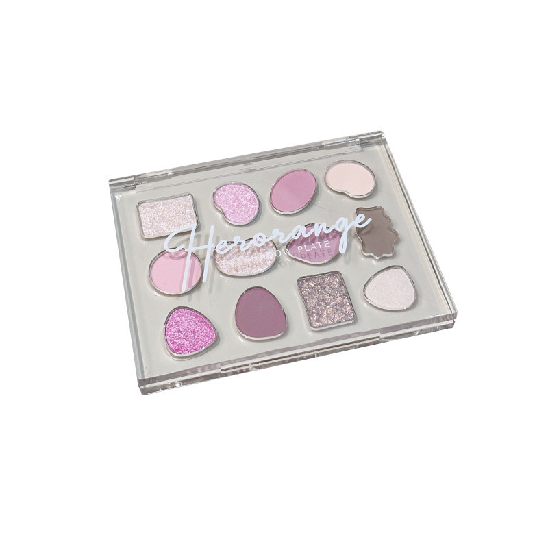 La paleta de sombras de ojos de alta calidad con carcasa transparente de 12 colores no es fácil de volar y duradera