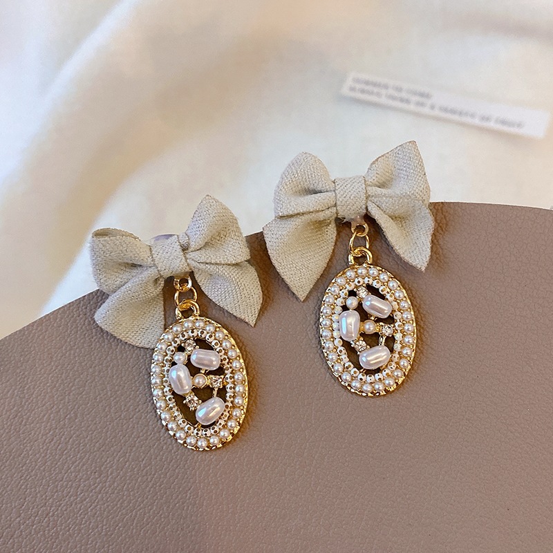 Elegant Bow Knot Inlay Alloy Pearl Drop Earrings display picture 3