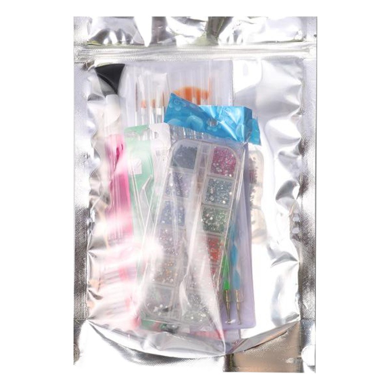 Herramientas de uñas transfronterizas traje de uñas arte pluma Archivo de uñas joyería de acero Punto de empuje taladro pluma manicura traje al por mayor