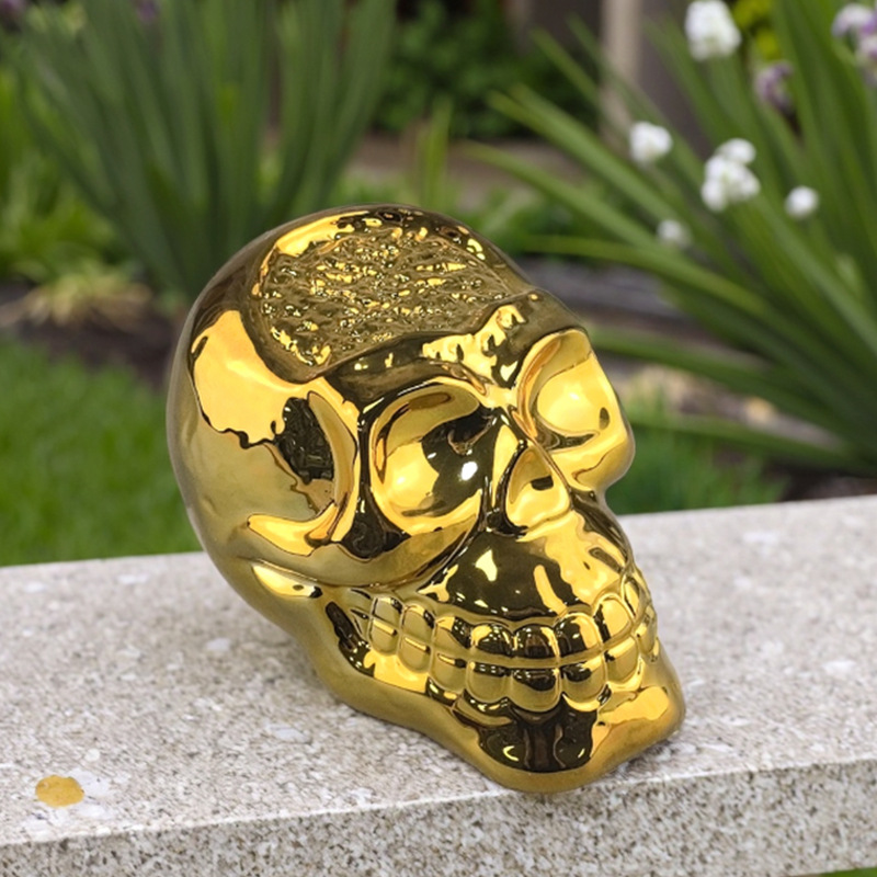 Halloween Ghost Festival Cerámica Calavera chapada en oro Adornos de la atmósfera de terror Cráneo de forma especial transfronterizo Artesanía de cerámica