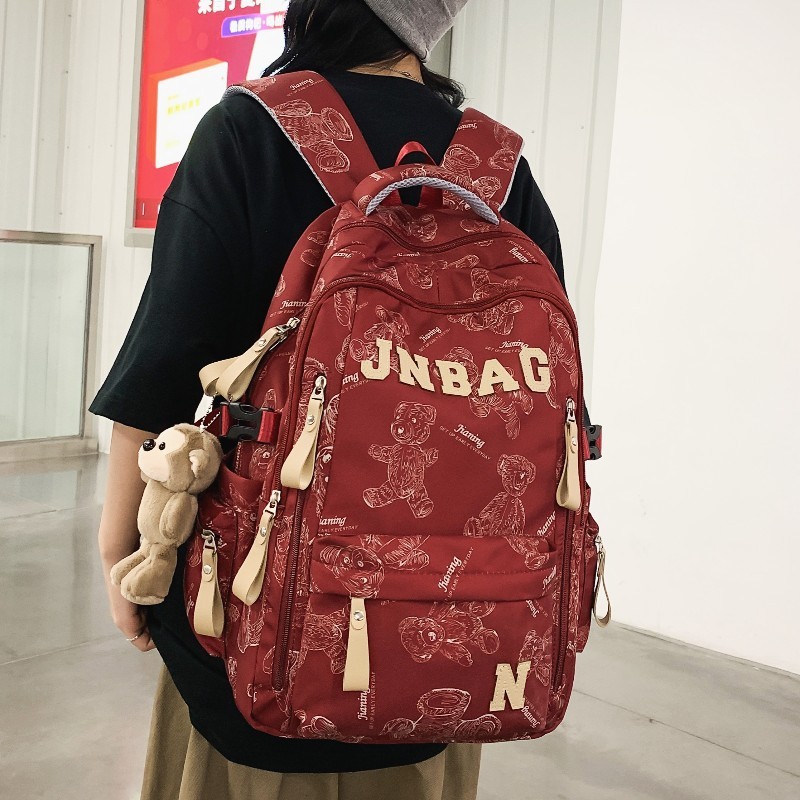 减负书包男生高中生大容量双肩包初中女生印花大学生休闲旅行背包|undefined