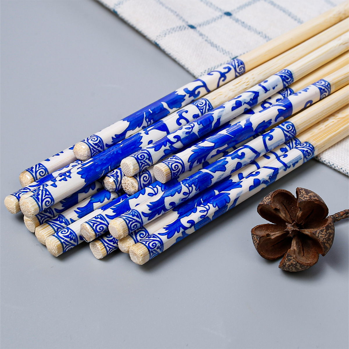 Palillos desechables grandes lotes de palillos redondos gruesos y largos de 24cm 50 pares de un paquete de palillos de película de impresión Embalaje independiente al por mayor