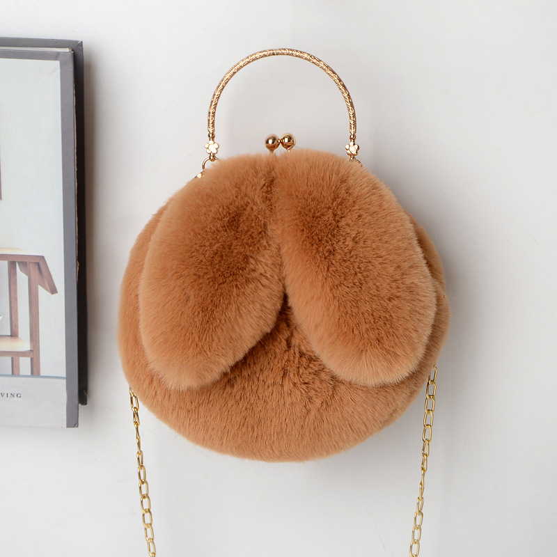 复制_2021新款兔耳朵包手提毛绒链条包包女士.jpg
