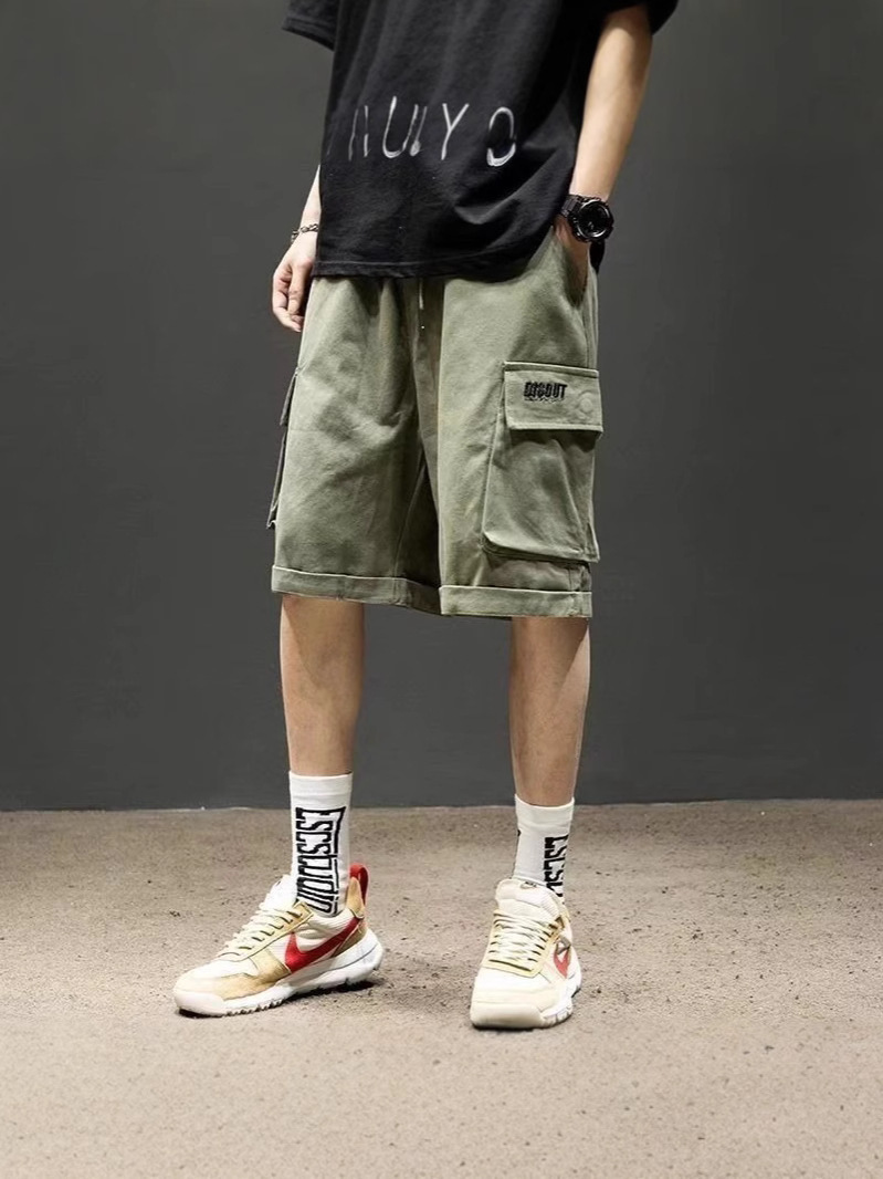 Nuevos pantalones cortos de herramientas de moda para hombres, pantalones de moda japoneses de verano, pantalones de cinco puntos sueltos de gran tamaño para hombres