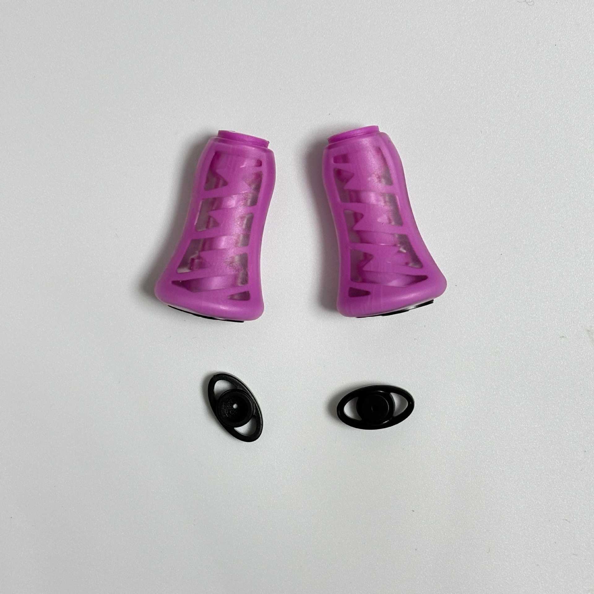 A pair of purple silicone grip balls