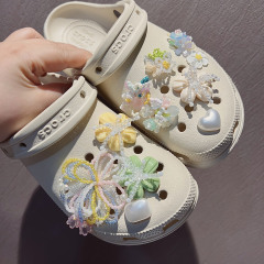 韓国の東大門の新しい手作りビーズジュエリー夏の新しいスーパーフェアリーホールシューズフラワーDIYシューズアクセサリー