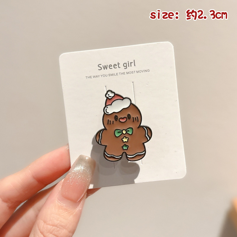 Broche de aleación de sentido avanzado japonés nueva insignia de personalidad de moda femenina de dibujos animados bolsa de Navidad accesorios de metal al por mayor