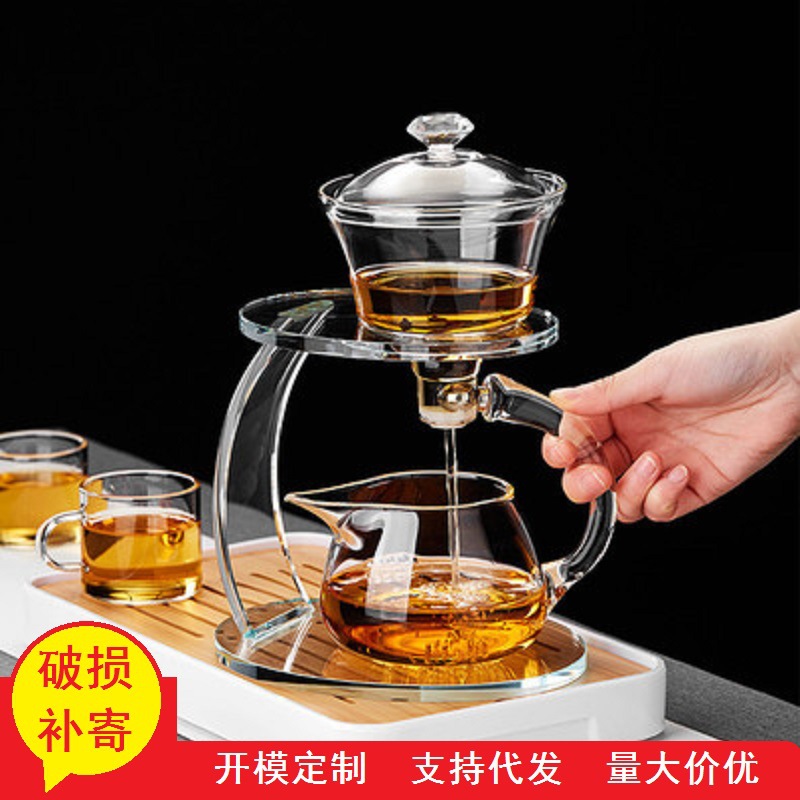 Fábrica al por mayor de vidrio resistente al calor taza de té perezoso traje hogar Kung Fu juego de té engrosada tetera de succión magnética Fabricación de té automática