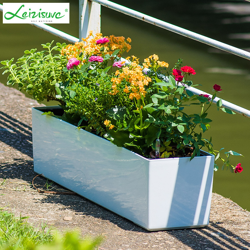 Laizhixiu perezoso maceta rectangular pintura resina balcón automático absorbente plástico perezoso maceta al por mayor