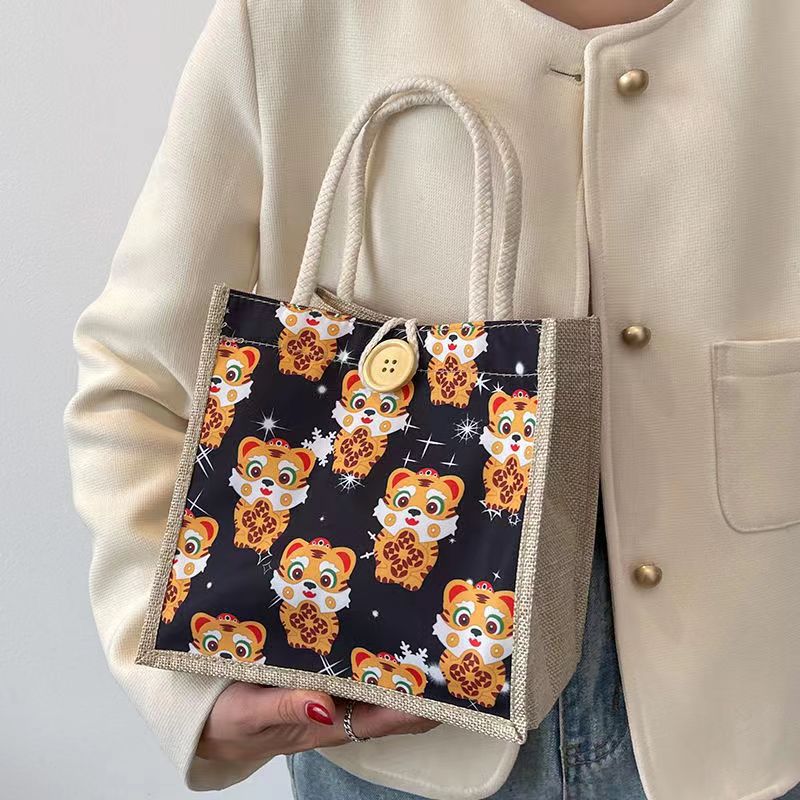 Algodón y lino Bento bolso bolsa para las mujeres 2022 Nuevo Tigre año de estilo occidental caja de almuerzo bolsa ins gran capacidad pequeña bolsa de hombro