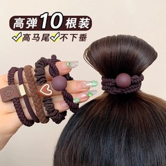 首紐の女性の新型のハイエンドのゴムは髪の毛を刺します。