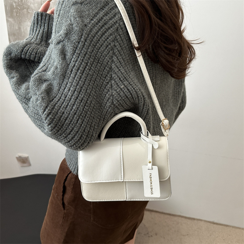 Bolso de mujer otoño / invierno 2024, nuevo estilo coreano de moda, bolso de brazo, bolso de diseño casual de color.