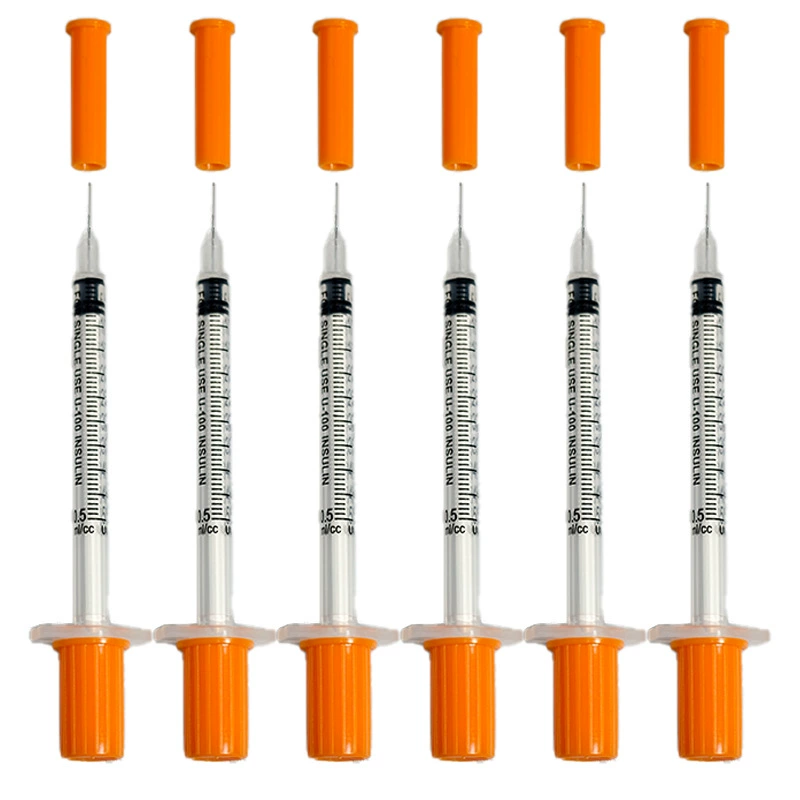 Одноразовый шприц-дозатор с иглой, объемом 1 мл/0,5 мл, с ручным приводом, винтовой крышкой и градуированной шкалой.