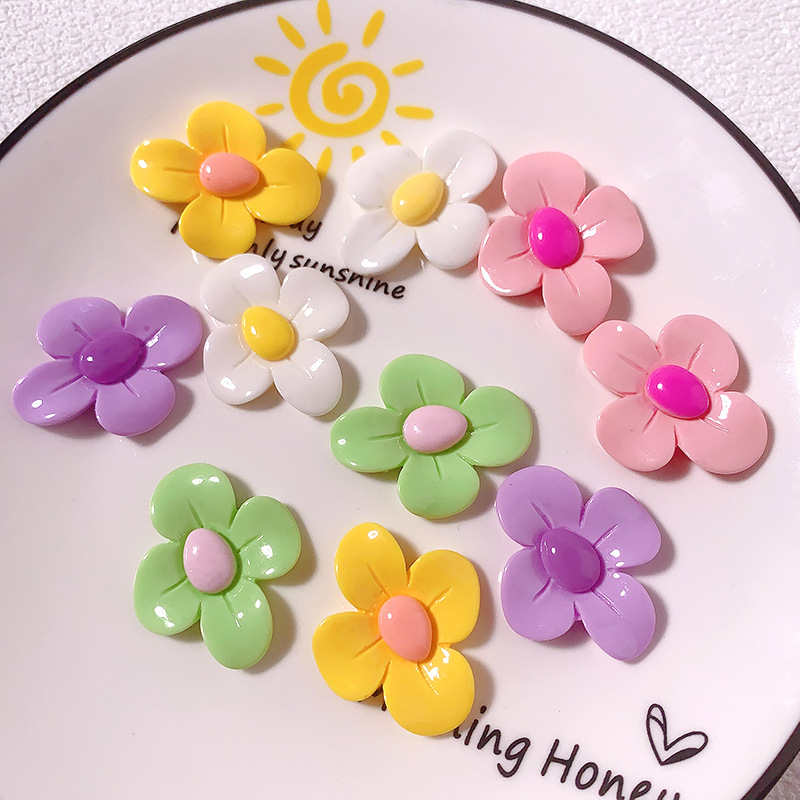 Accesorios de resina de cuatro pétalos de macarrón transfronterizo DiDi accesorios para el cabello de la caja del teléfono móvil agujero de los zapatos colgantes pequeños materiales hechos a mano