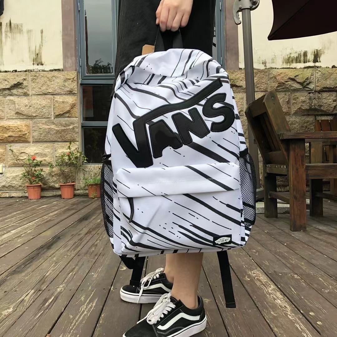 新款涂鸦背包户外运动休闲潮酷双肩包校园男女大容量高中学生书包