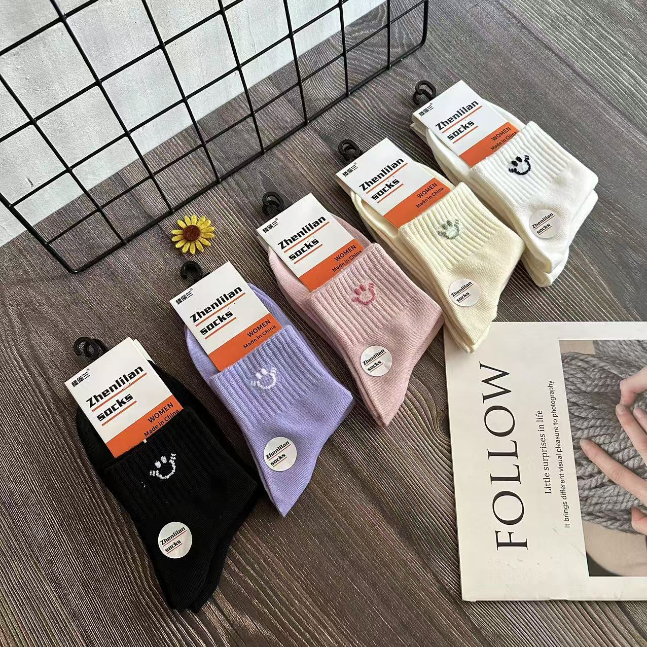 Calcetines para hombres de otoño e invierno al por mayor, calcetines de tubo, calcetines de algodón Zhuji, calcetines deportivos para estudiantes, calcetines para correr para hombres y mujeres