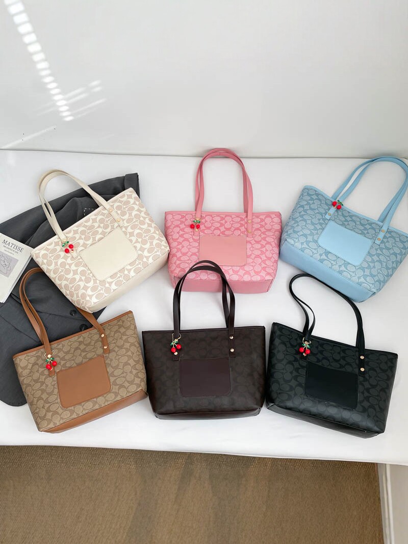 2026 nuevo bolso de mujer de gran capacidad de transporte de hombro bolso de moda versátil bolso de moda bolso de moda colgante de cereza bolso