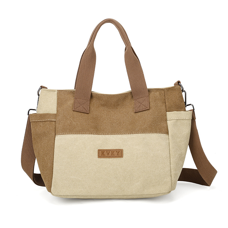 2026 bolsas de lona para mujeres nuevas bolsas de mochila casuales TOT con estilo coreano simple y gran capacidad bolsas de hombro