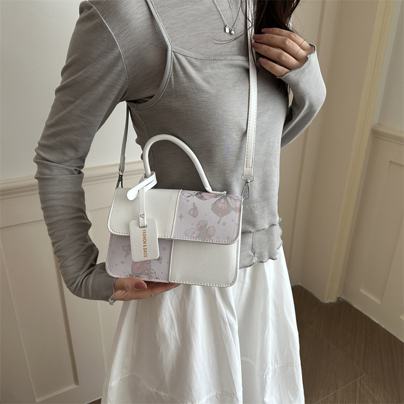 2026 nuevo paquete de hombro extranjero empalmado paquete de hombro de moda simple bolso de mano casual bolso pequeño transfronterizo
