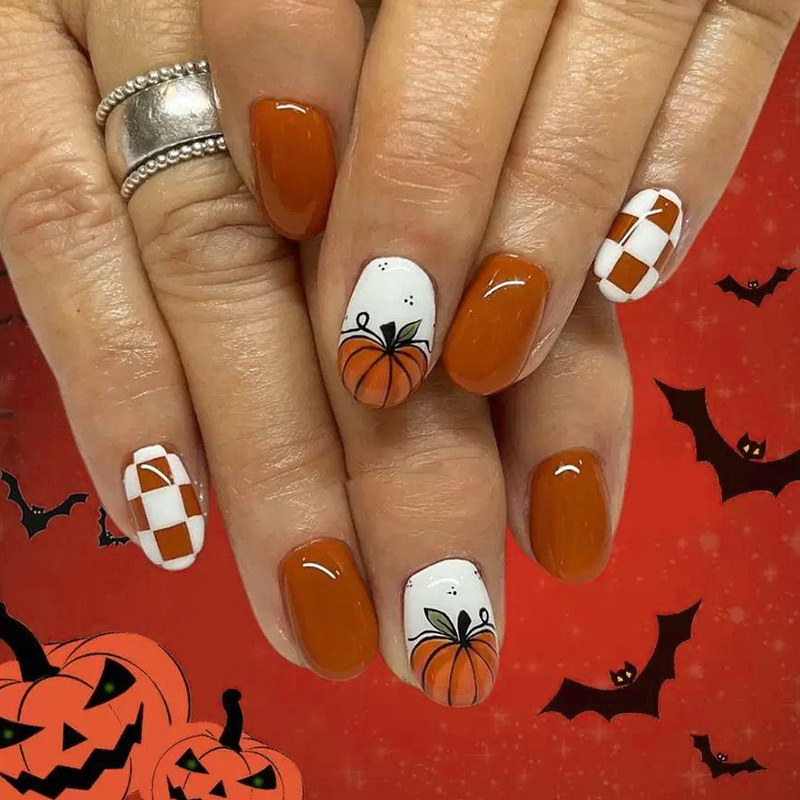 New nail art designs: European and American Halloween-themed, dirty orange plaid, pumpkin-style, short, oval-shaped press-on nails, wholesale New nail art designs: European and American Halloween-themed, dirty orange plaid, pumpkin-style, short, oval-shaped press-on nails, wholesale