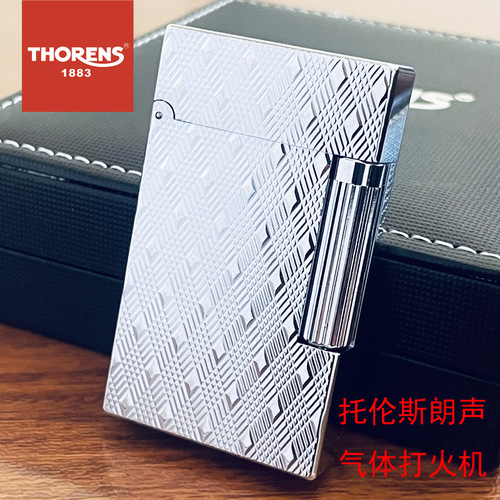 The brand originates from Swiss THORENS Torrens Gas Lighter Creative Brass Carved Grinding Wheel Steel Sound