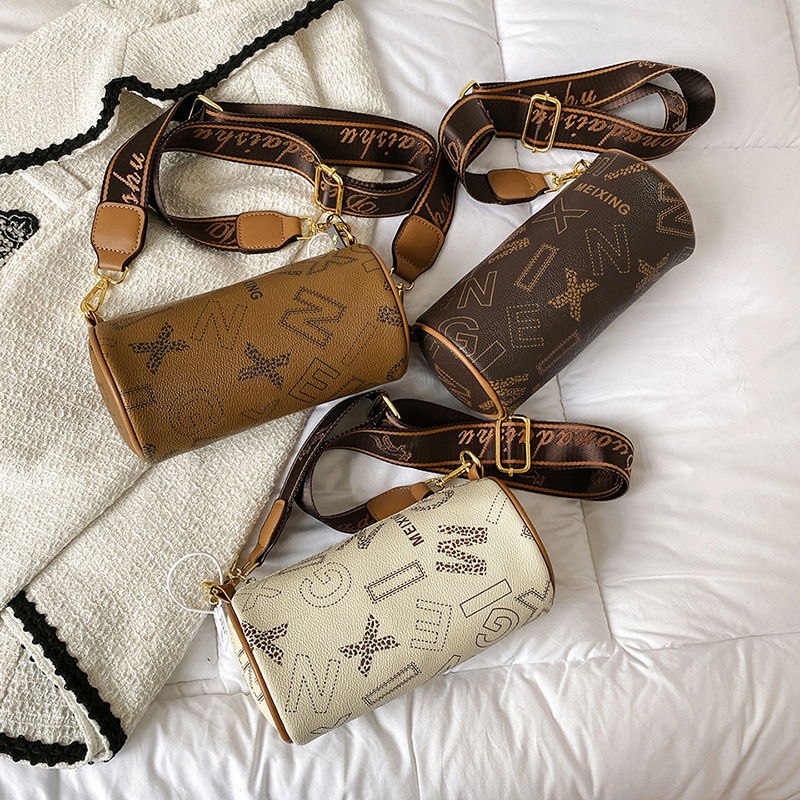 Trendig bokstavscylindrisk för kvinnor 2024 ny mode koreansk version väska, snygg textur PU enkel kvinnors axelväska_voghion.com