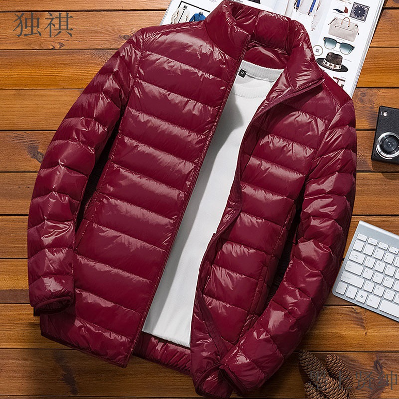 2023 nueva chaqueta acolchada de algodón de plumas ligeras de invierno para hombres con cuello de pie corto Chaqueta ultrafina slim fit de estilo coreano más abrigo de tamaño