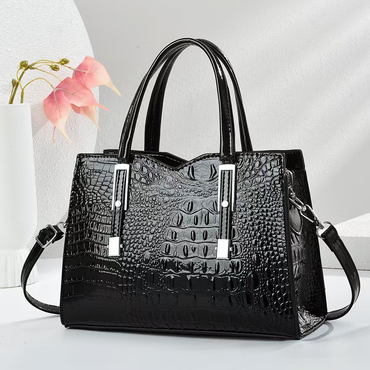 Emperor rinoceronte retro nicho bolso de mano mujer 2025 primavera y verano patrón de cocodrilo todo fósforo pequeño bolso de transporte nuevo