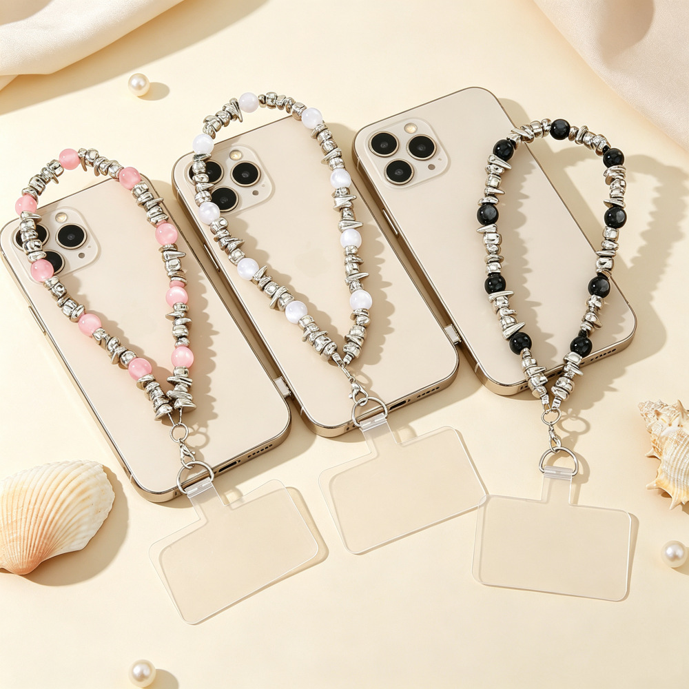 Trendy handmade crystal phone chain with dazzling cat's eye stone, Amazon best-selling phone accessory, comes with a pad