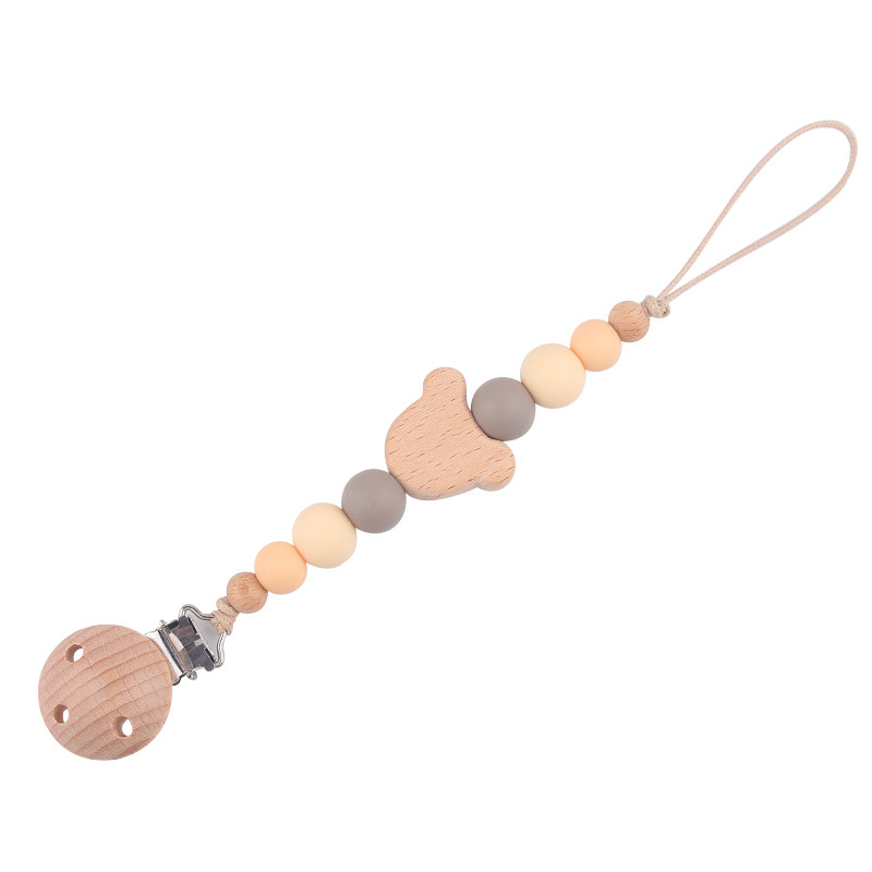 Productos para bebés Clip de chupete de madera de haya Dibujos animados de bebé creativo Oso de madera de haya Muerde los dientes Cadena de chupete anti-caída