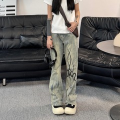 American retro washing yellow mud dyed flame afterimage micro-flare jeans for women niche trendy brand versatile floor trousers