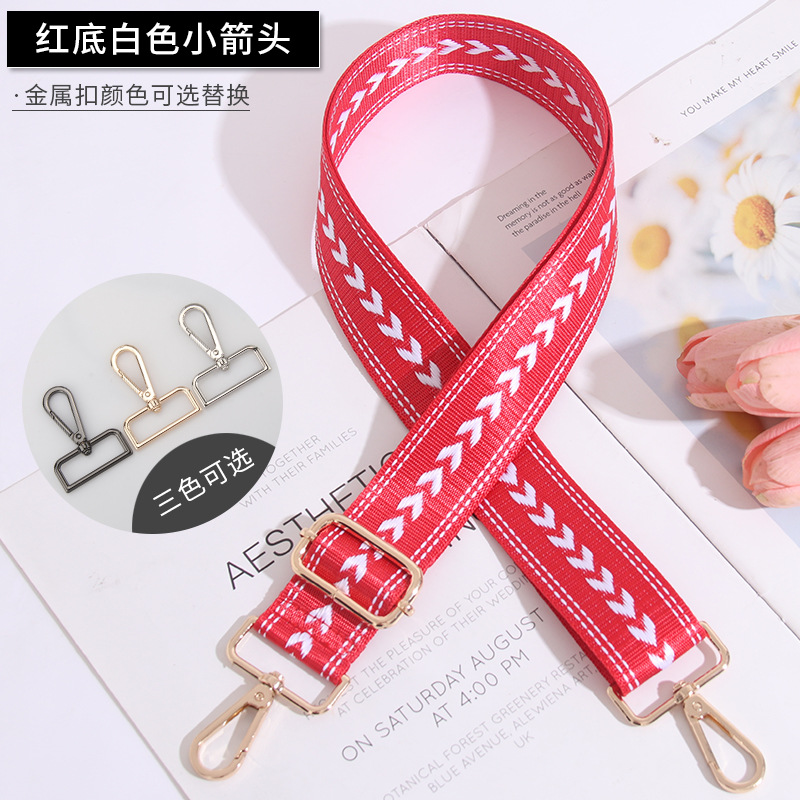 Small white arrow on red background