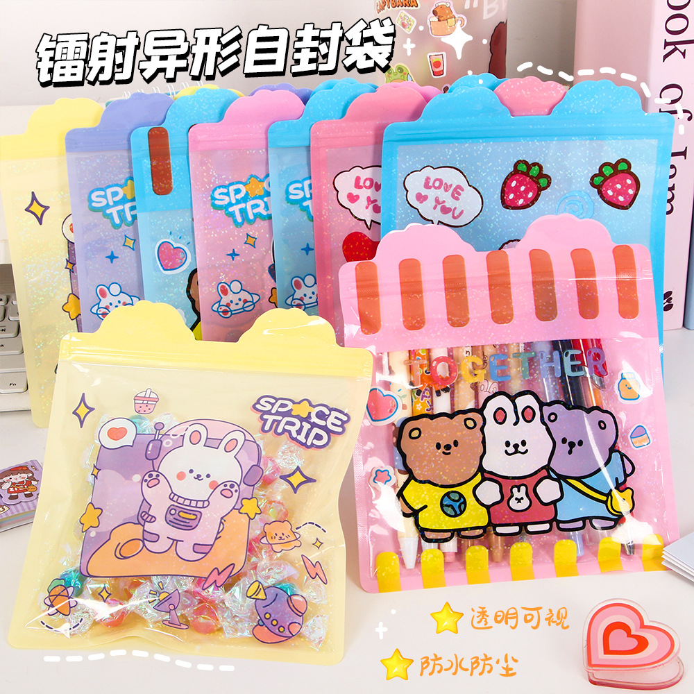 Bolsa de sello láser especial de dibujos animados encantadora bolsa de sellado translúcida pequeña galleta snack bolsa de embalaje de joyas