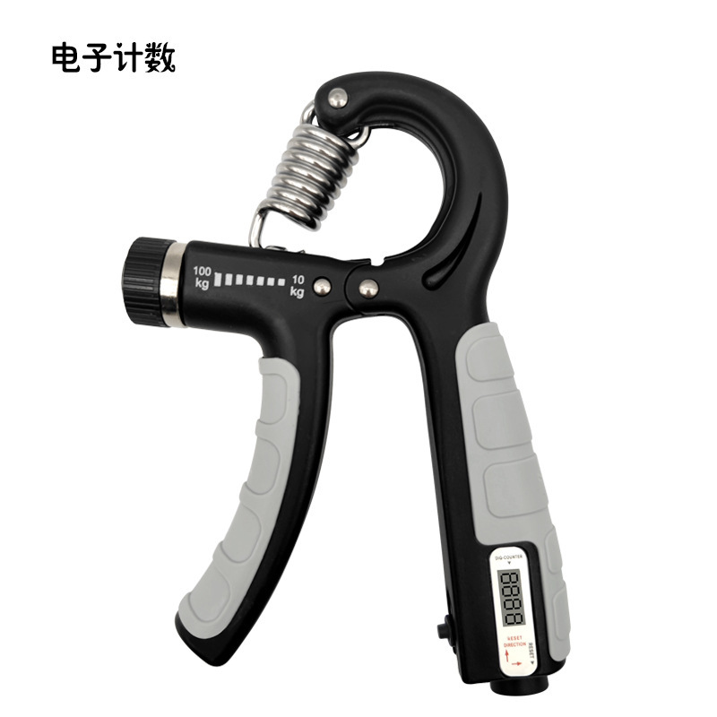 握力器は腕の男性の専門力のフィットネスの器材を練習します。|undefined