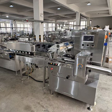 月饼带拖盒枕式包装机智能理料自动吸拖盒可与生产线相连