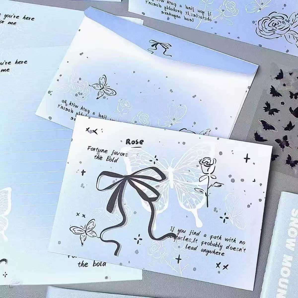 A set (4 envelopes + 4 letter papers)