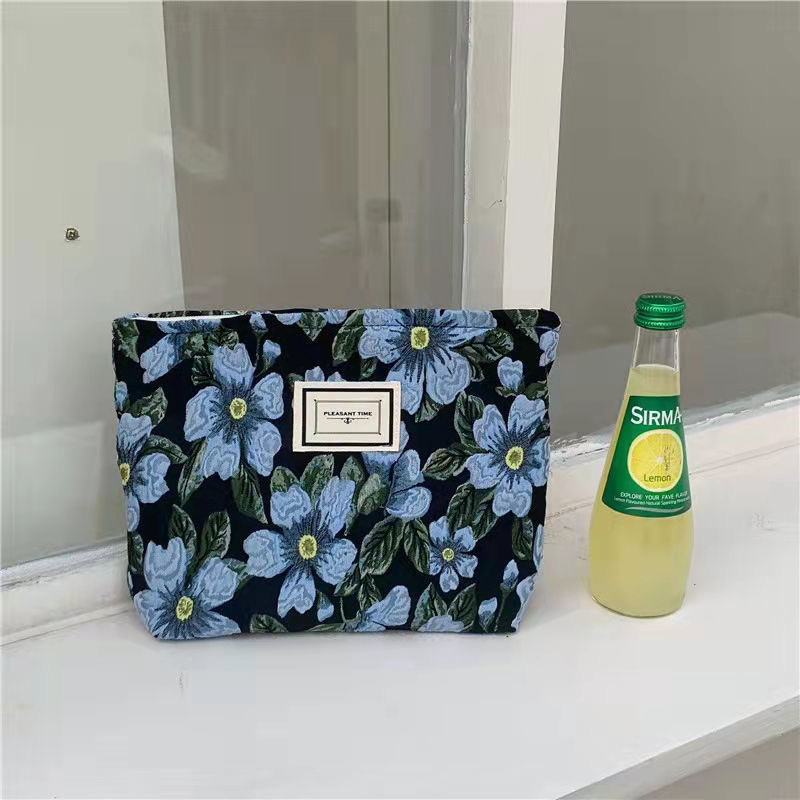 Bolsa de cosméticos de gran capacidad portátil fresco pequeño floral ins bolsa de almacenamiento bolsa de lavado elegante bolsa de almacenamiento jacquard
