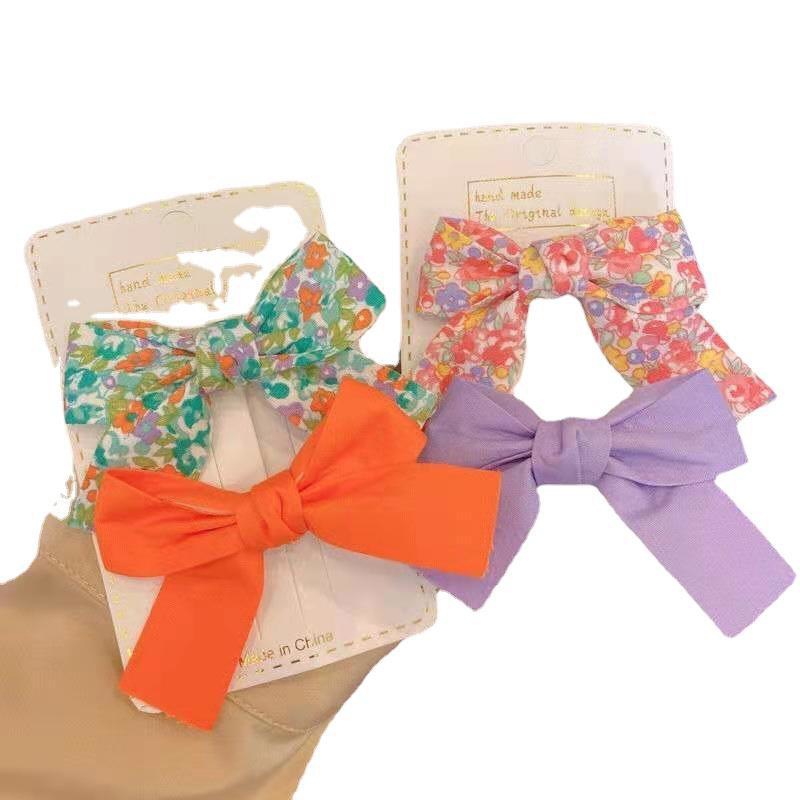 Estilo coreano fresco floral arco horquilla niños macaron color presión clip flujo mar clip lateral traje accesorios para el cabello