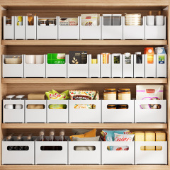 おもちゃの本の文房具の収納箱のデスクトップの雑品のマスクの整理箱の食器棚の分類の凹形は日本式を取ります。