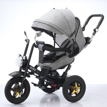 现货批发儿童三轮车婴幼儿多功能可坐可躺灯光音乐手推车自行车