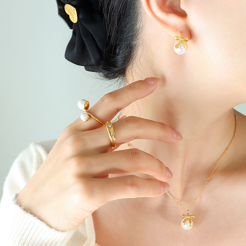 Marka estilo francés ins imitación perla arco pendientes titanio acero 18K oro collar cadena clavícula joyería traje