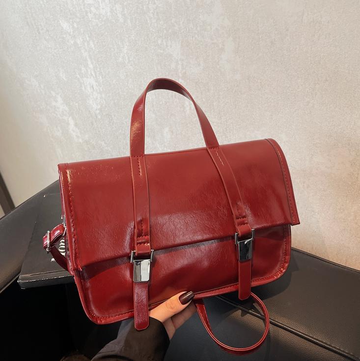 Otoño y invierno retro bolso de mano simple para mujeres 2024 nuevo paquete de hombro casual de gran capacidad de viaje bolsa de correo universal