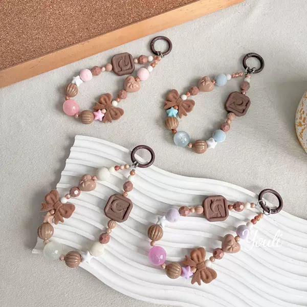 Creative building block-style flocked bead phone chain, beaded pendant, fashionable autumn/winter pom-pom keychain, hanging chain, and decorative accessory
