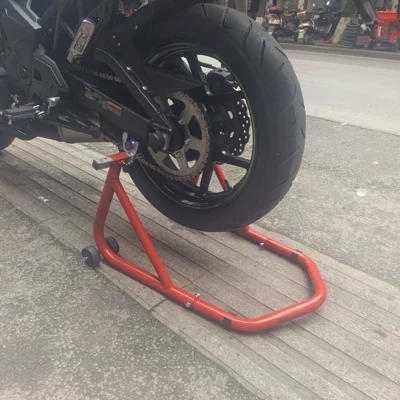 Motorcycle frame: rear wheel parking stands, and