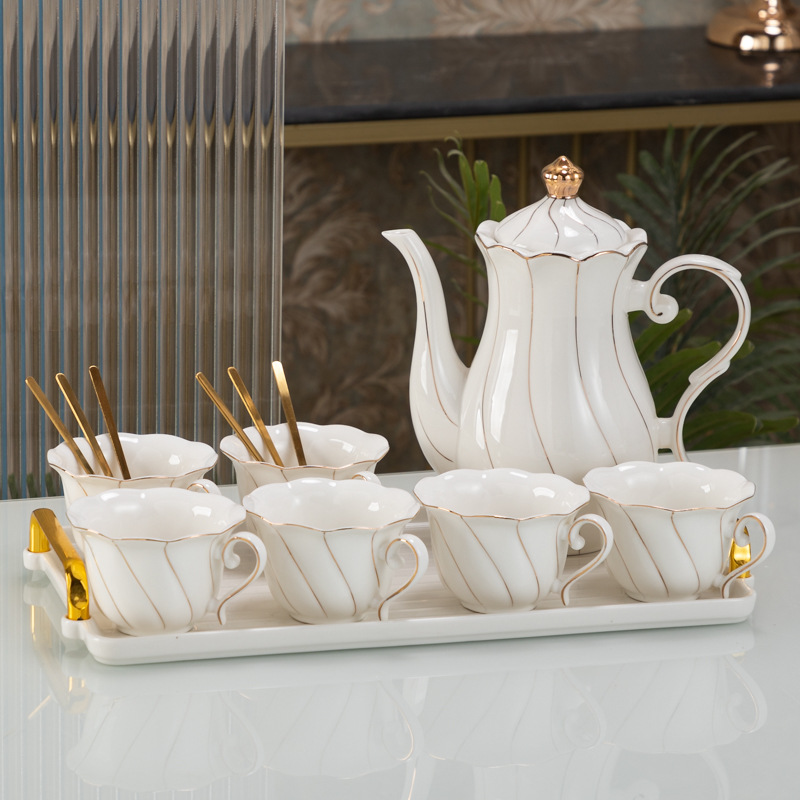 Nórdico de oro ligero lujoso Feng Shui conjunto de tazas de cerámica hervidor de agua set de regalos con bandeja transfronteriza