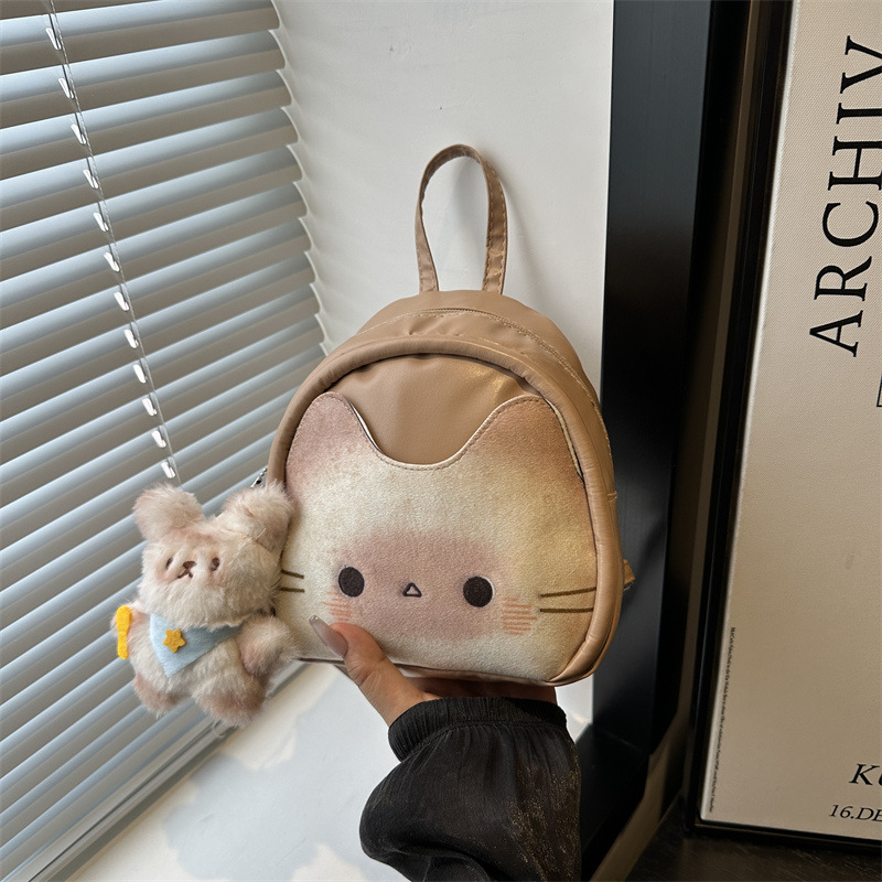 Mochila de dibujos animados de alto nivel para mujeres 2025 nueva moda mochila de viaje, mochila de mamá, mochila escolar casual coreana.