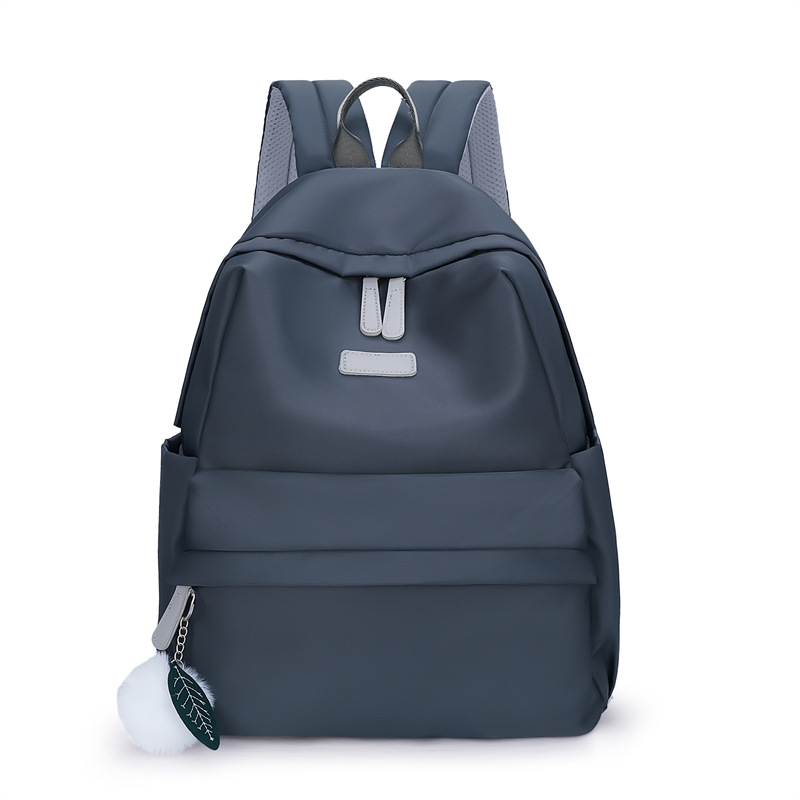 Spot al por mayor 2023 nueva mochila de tela Oxford para mujer coreana simple y versátil mochila para computadora de gran capacidad marea