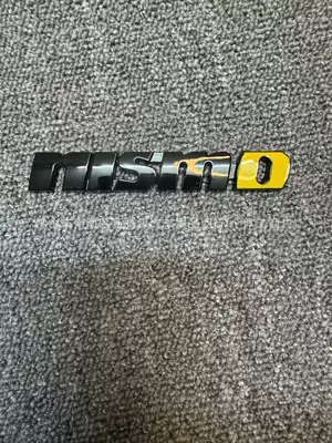 Metal Car Logo Nissan Patrol: Car logo - standard-nismoblack-and-yellow